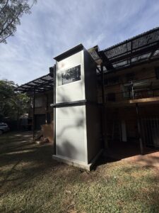 Home Lifts 92 Outdoor home lift shaft installed against the exterior of a two-storey house