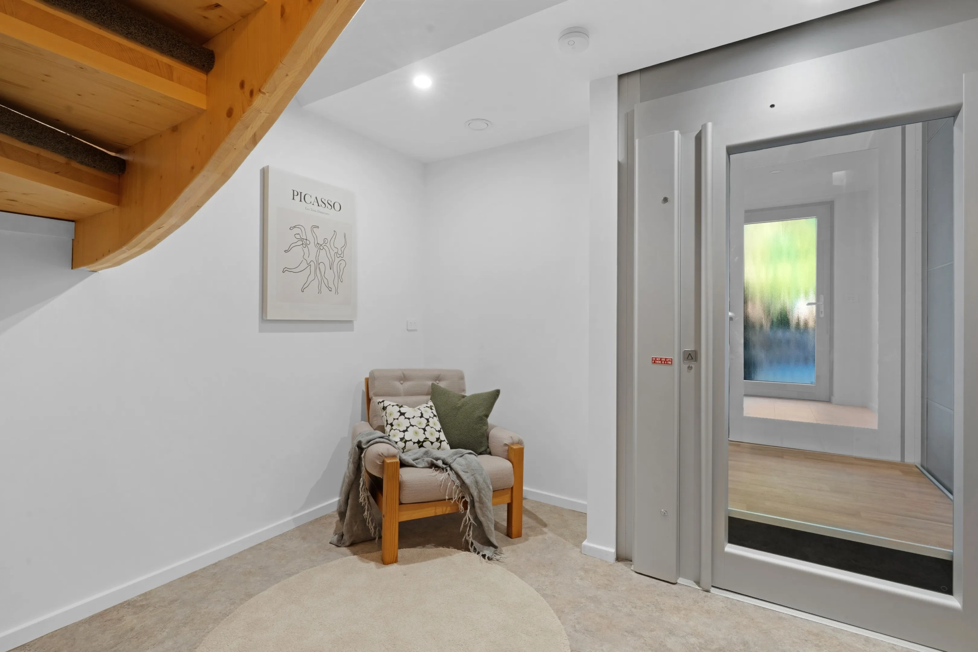 Blogs 2 Enclosed home lift fitted next to an internal staircase